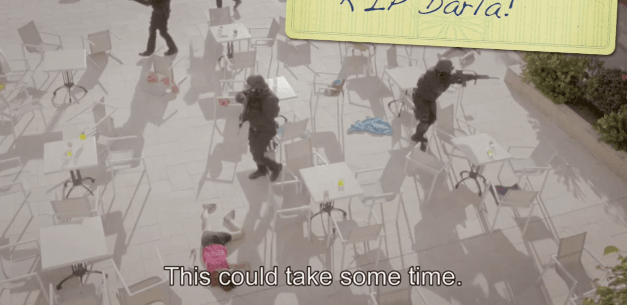 Aerial view with subtitle 'This could take some time'