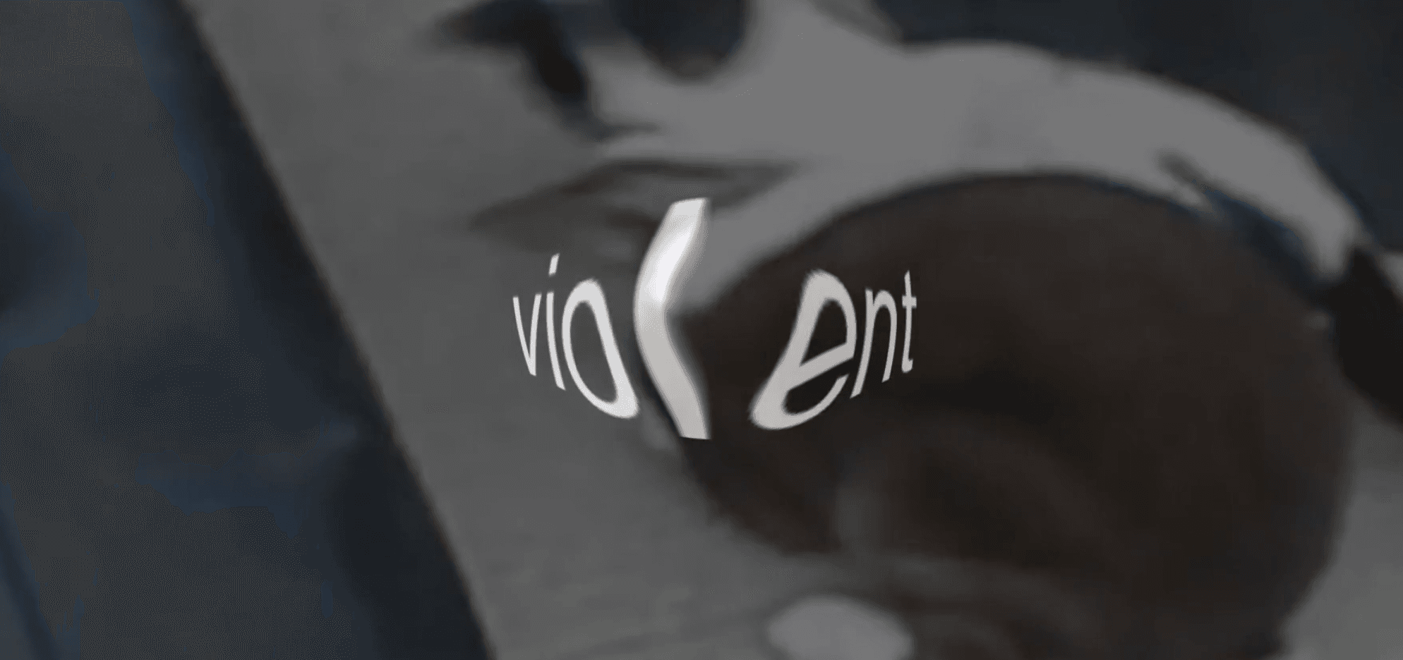Video still showing 'violent' text